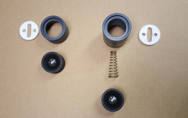 Metering pump valve assemblies